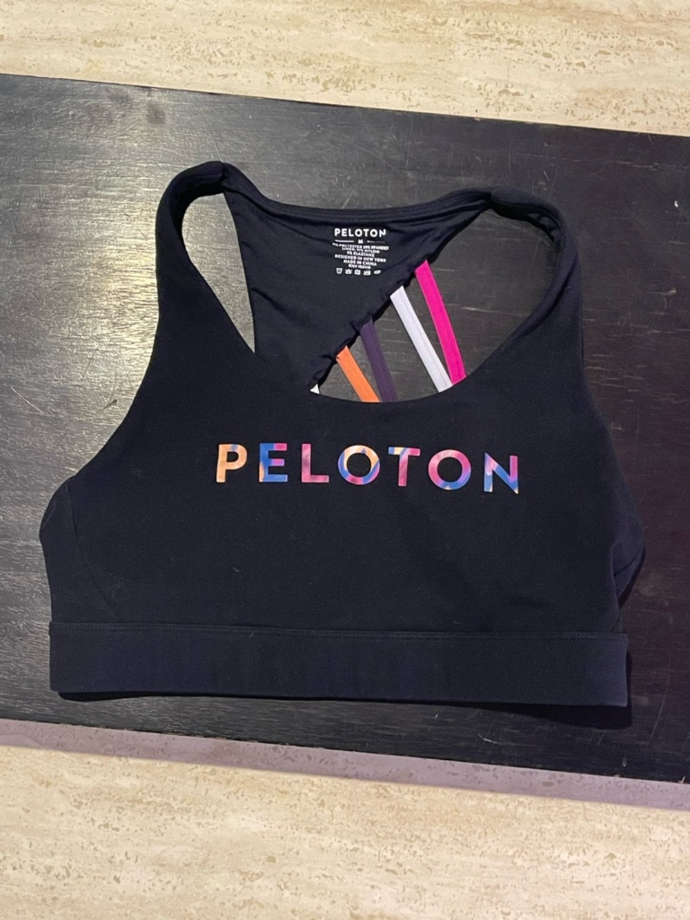 Peloton Black Sports Bra with Rainbow Logo and Colorful Straps